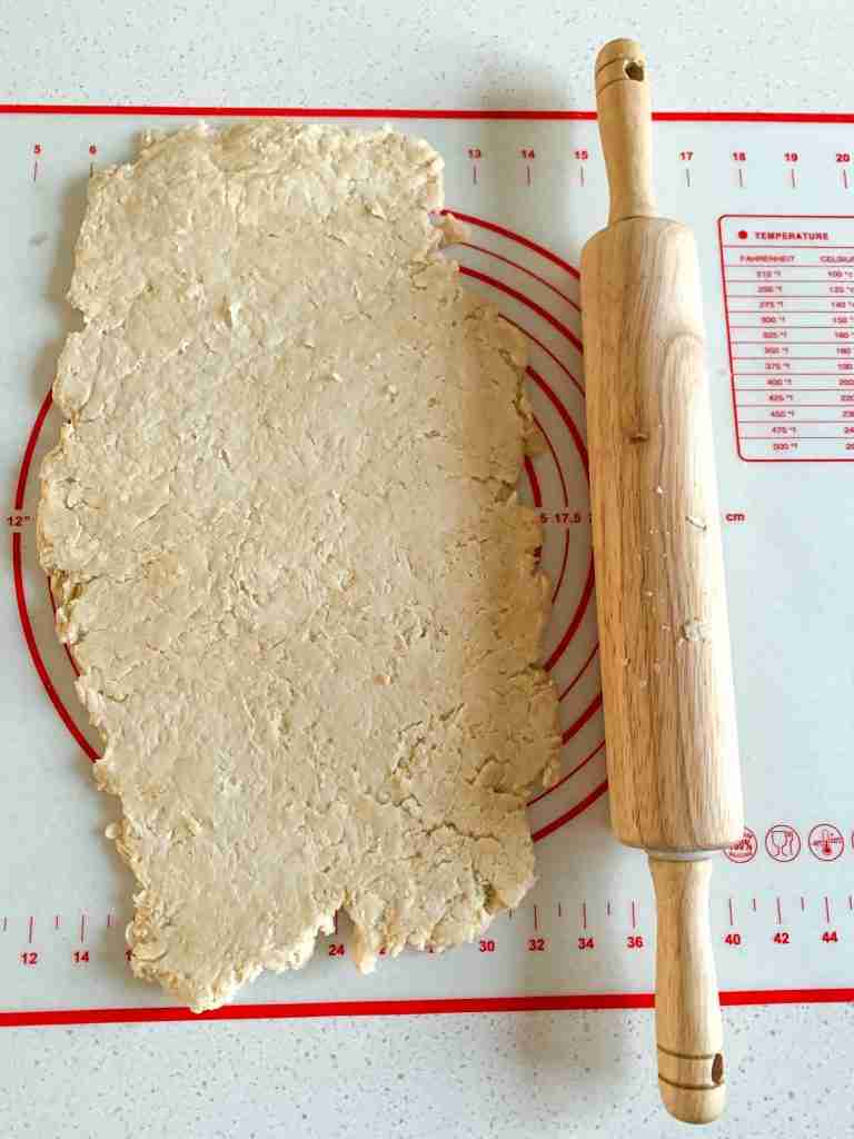 dough rolled out on a mat