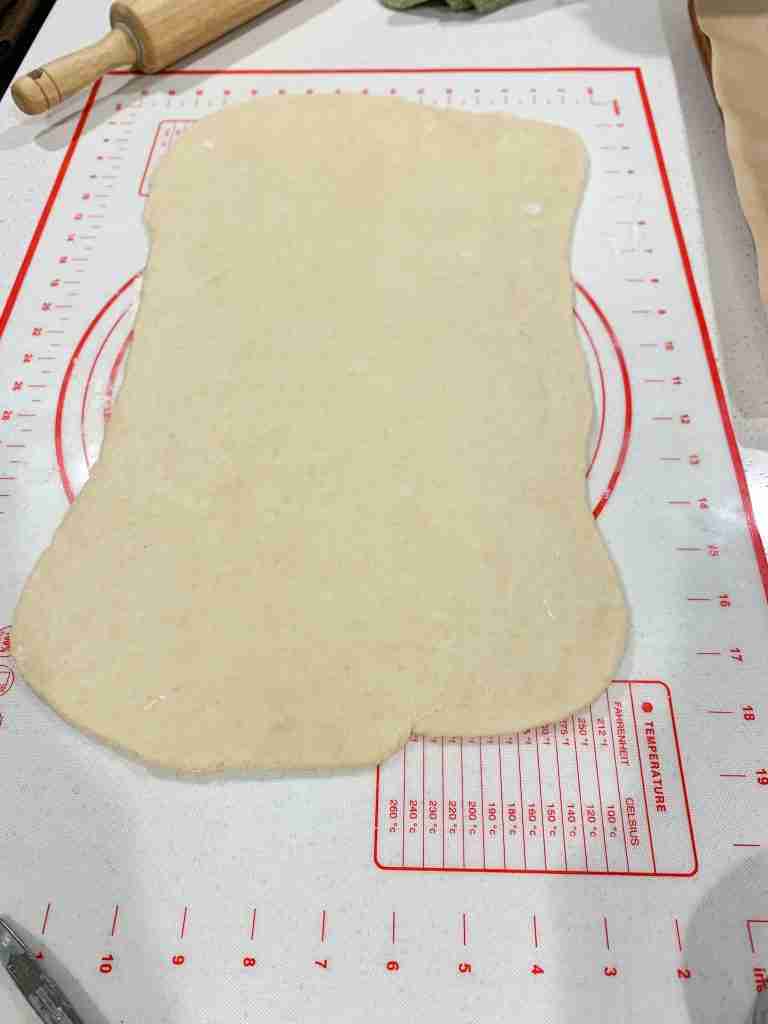 large rolled out piece of dough