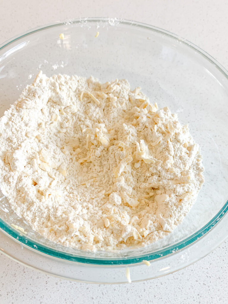 grated butter stirred into dry sourdough scone mixture