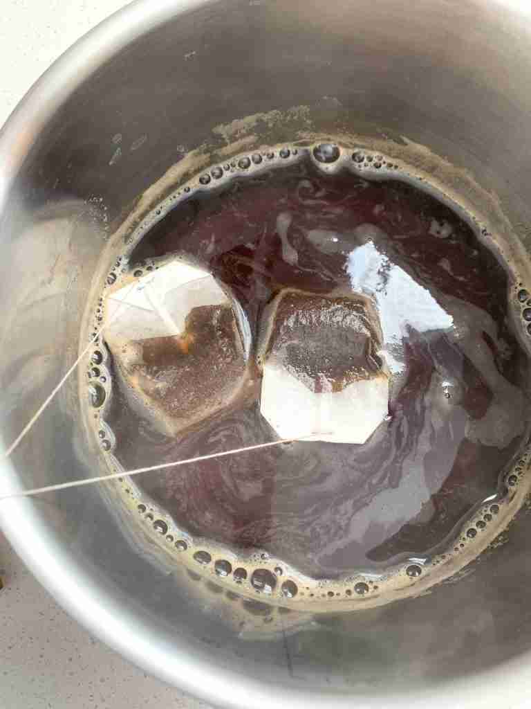 tea being brewed in a pot