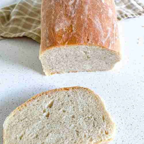loaf of bread with a slice cut off