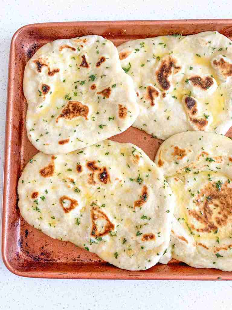 tray of butter herb brushed breads