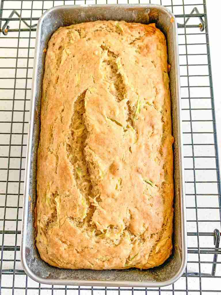 bread loaf in a pan being photographed over head