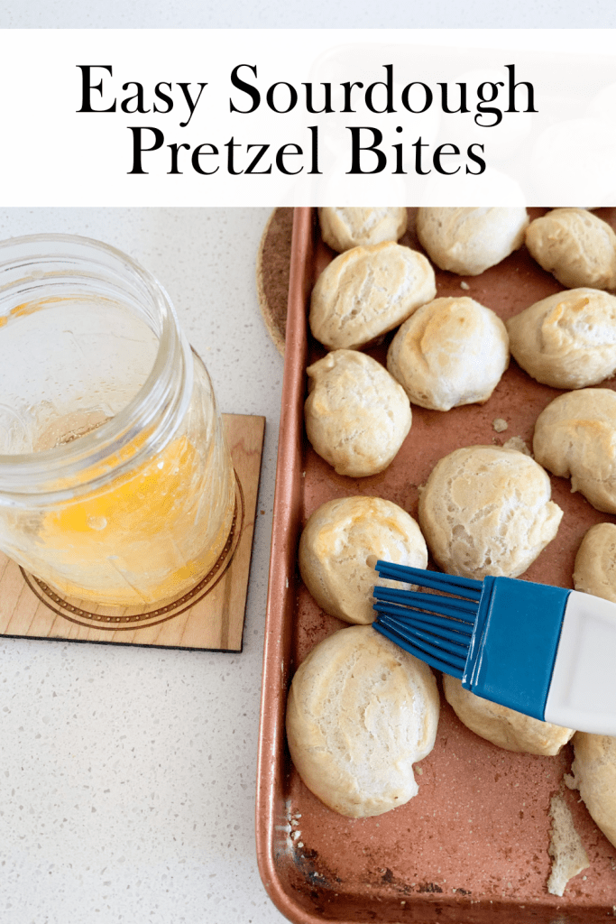 brush brushing butter on dough