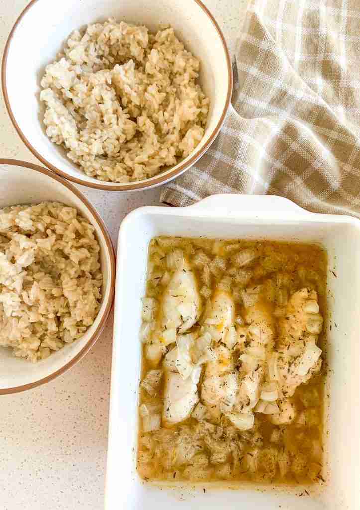 casserole with seasoned chicken and 2 bowls of brown rice 
