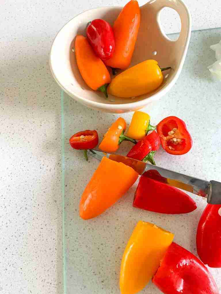 mini peppers getting cut up