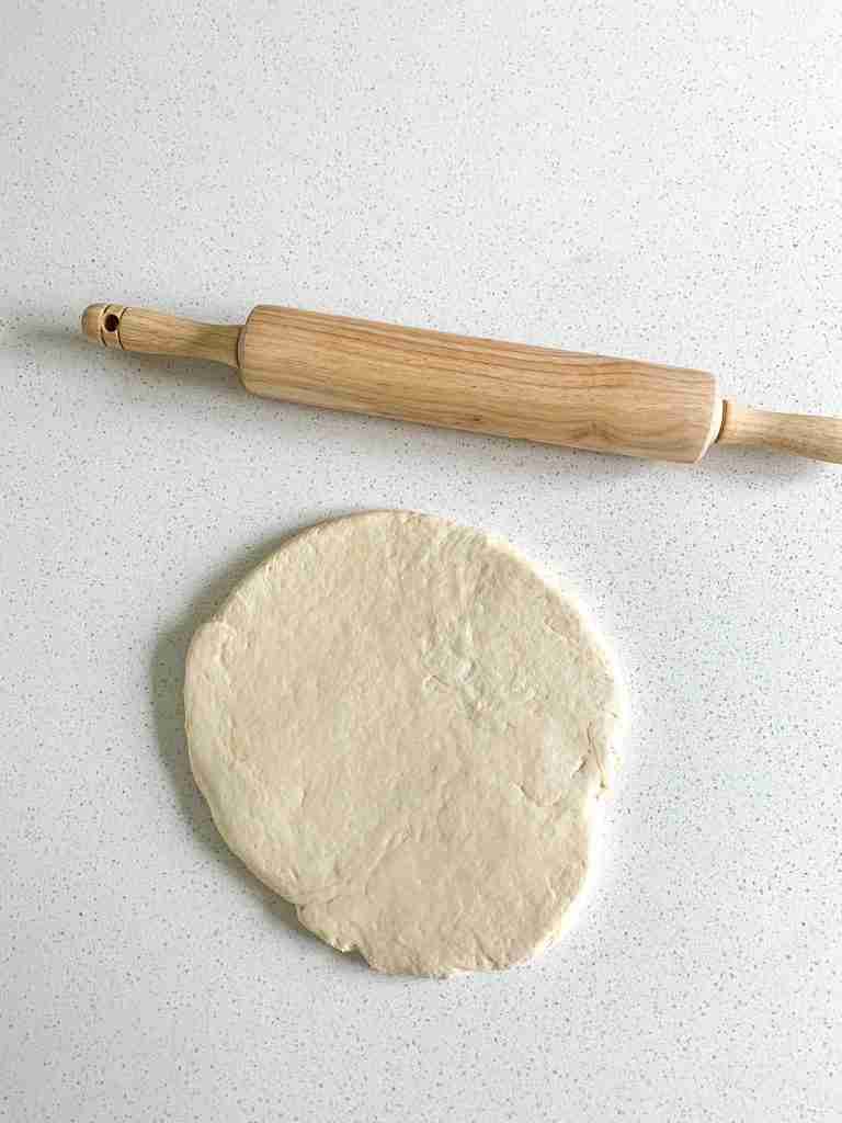 sourdough english muffin dough rolled out