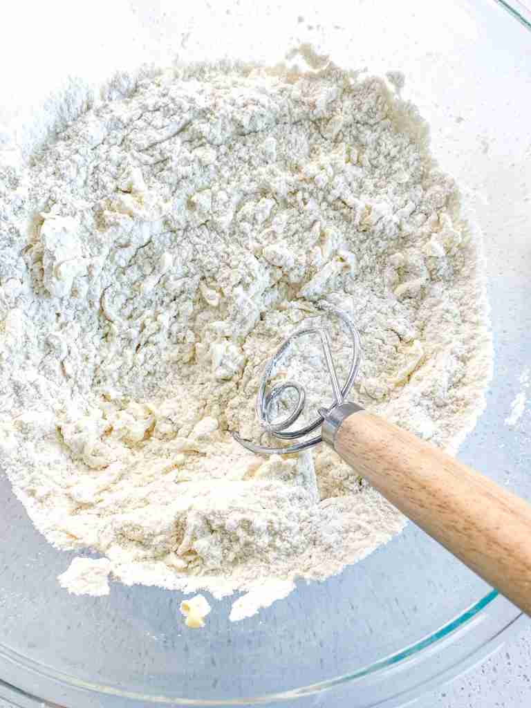 mixing dry ingredients for croissant dough