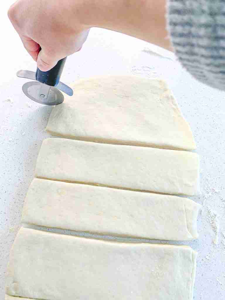 cutting croissant dough