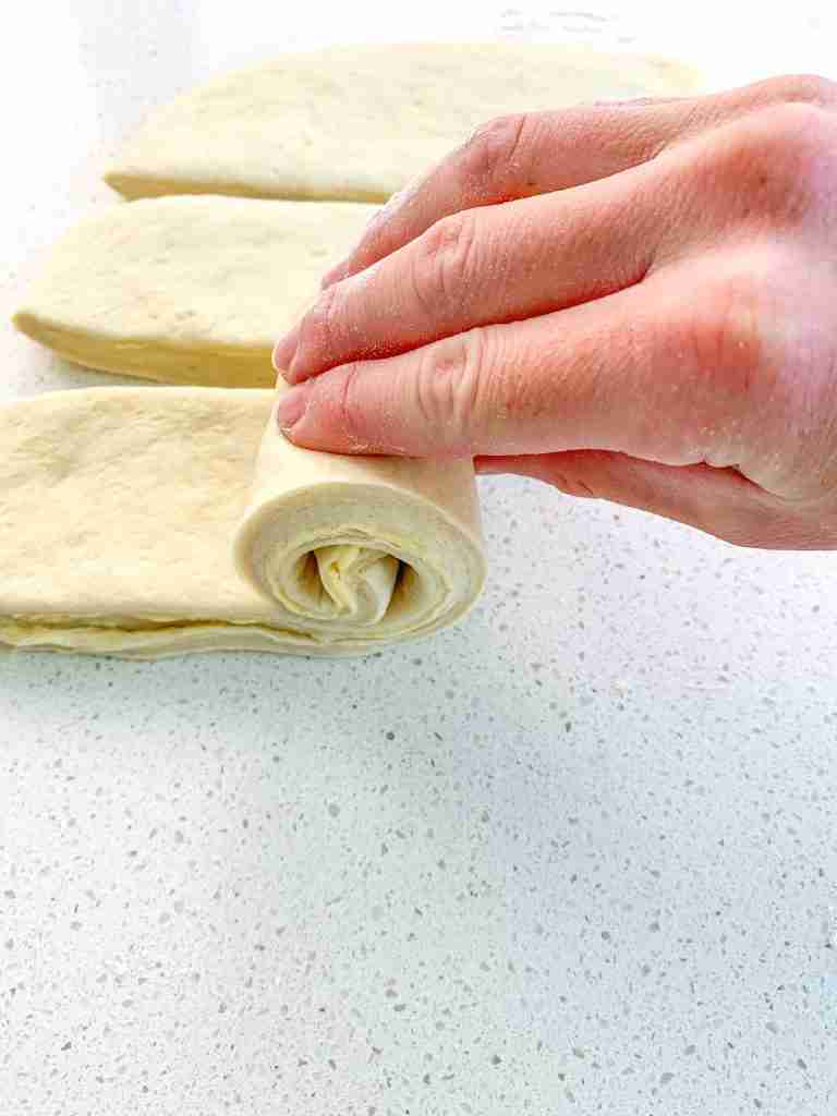 rolling croissant dough