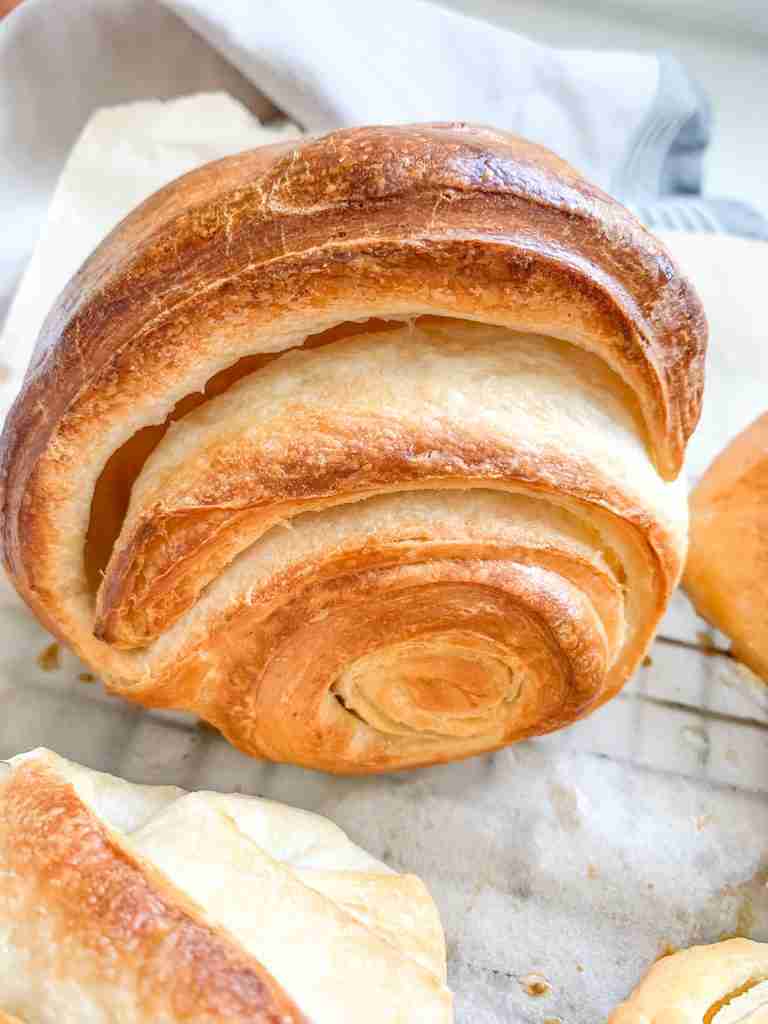 freshly baked sourdough croissants that are flaky
