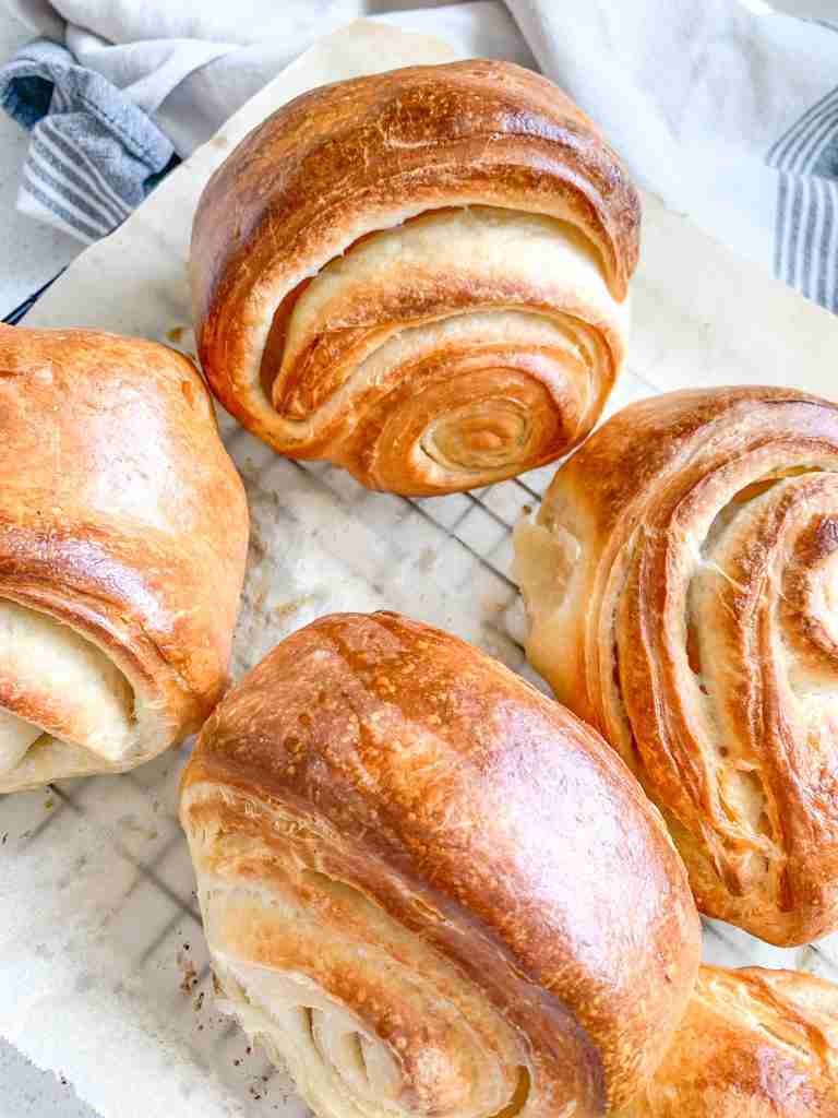 freshly baked sourdough croissants that are flaky