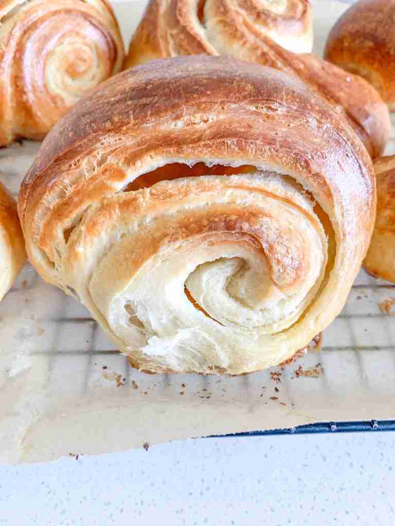 freshly baked sourdough croissants that are flaky