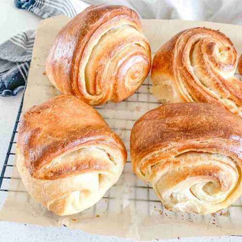 freshly baked sourdough croissants that are flaky