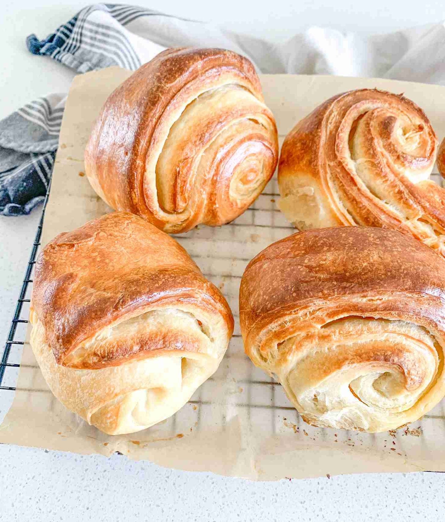 freshly baked sourdough croissants that are flaky