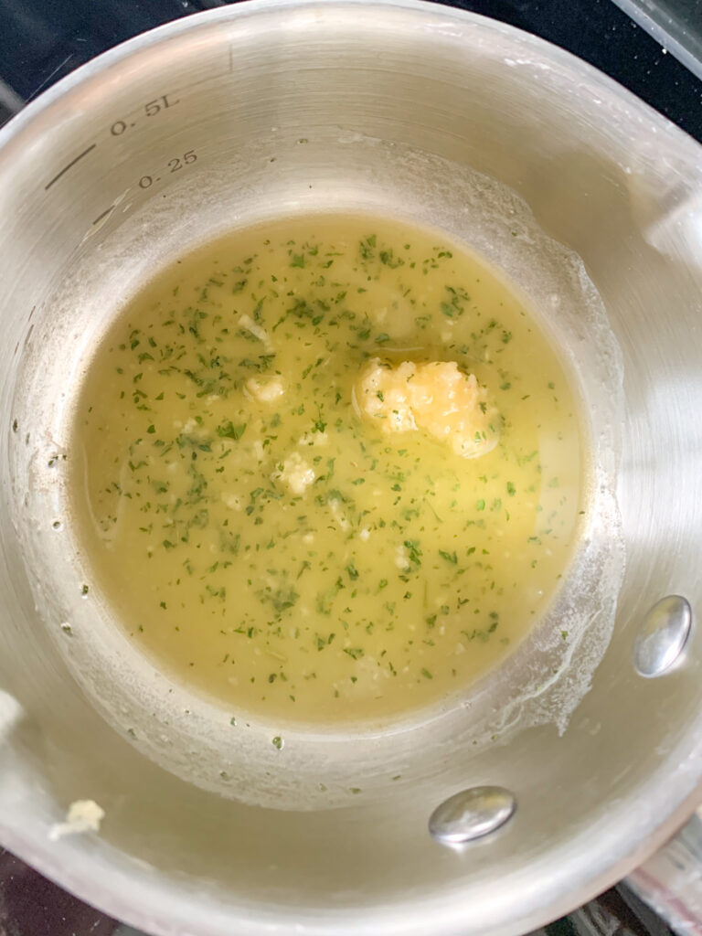 melting garlic butter in a pan