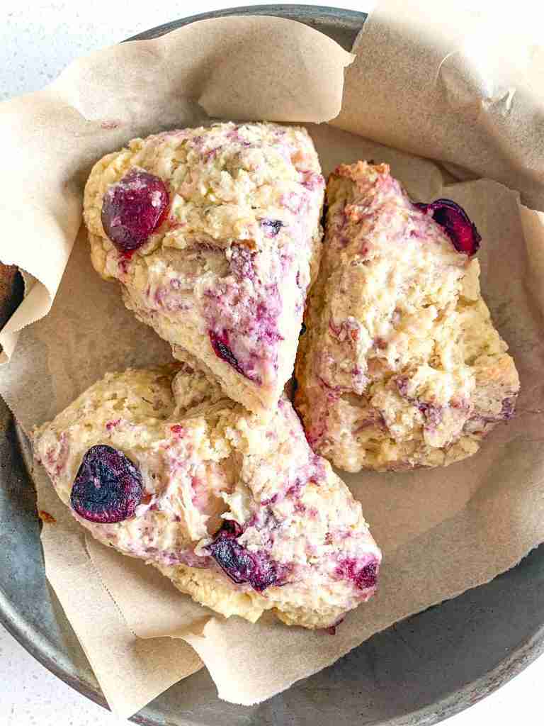 3 cherry scones in a basket