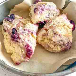 3 cherry scones in a basket