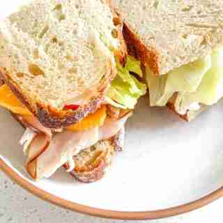 sandwiches with turkey, cheese, apple, lettuce