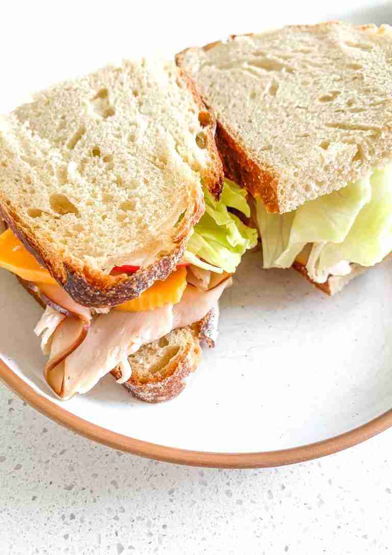 sandwiches with turkey, cheese, apple, lettuce