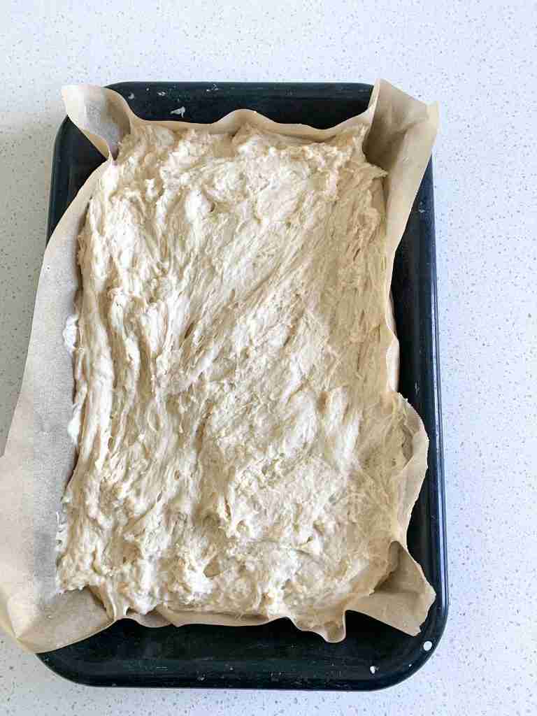 focaccia dough in a pan