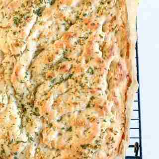 focaccia bread on a wire rack