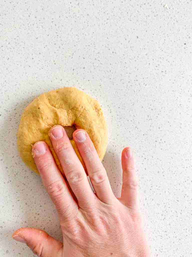 shaping pumpkin bagels