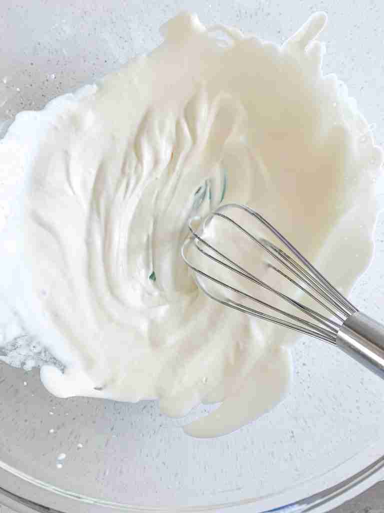 in the middle of whipping whipped cream mixture