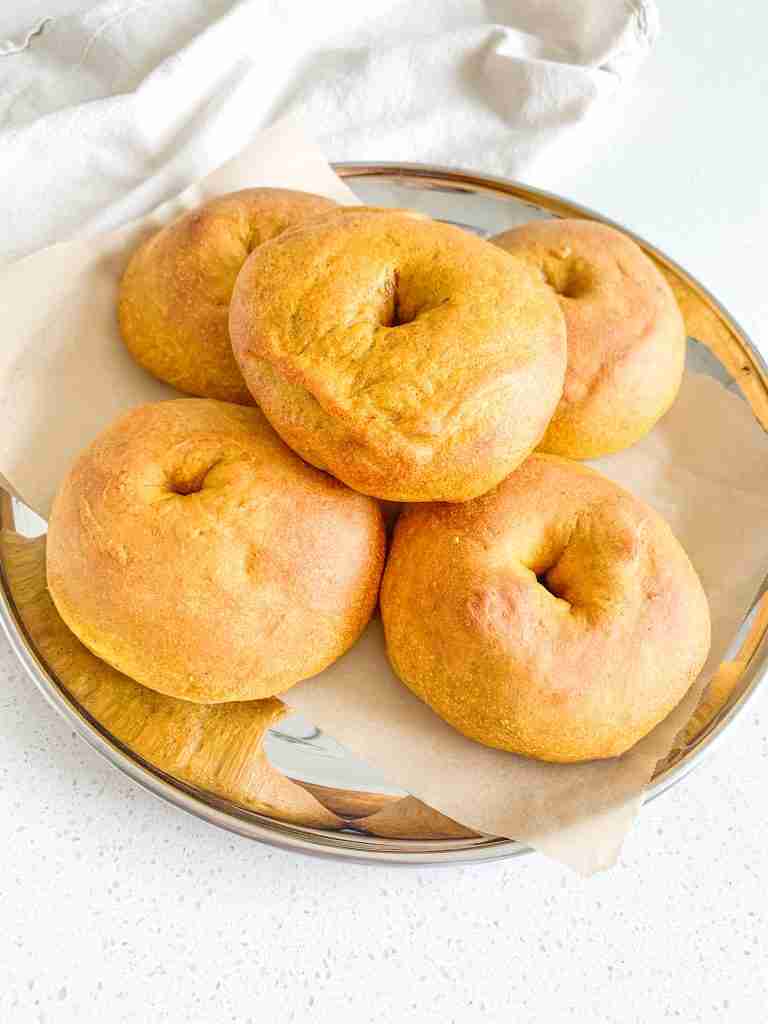 freshly baked sourdough pumpkin bagels