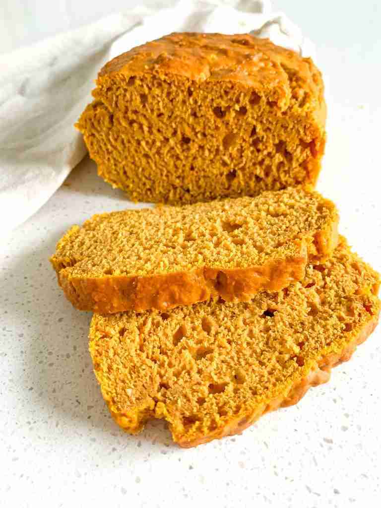 loaf and slices of sourdough pumpkin bread