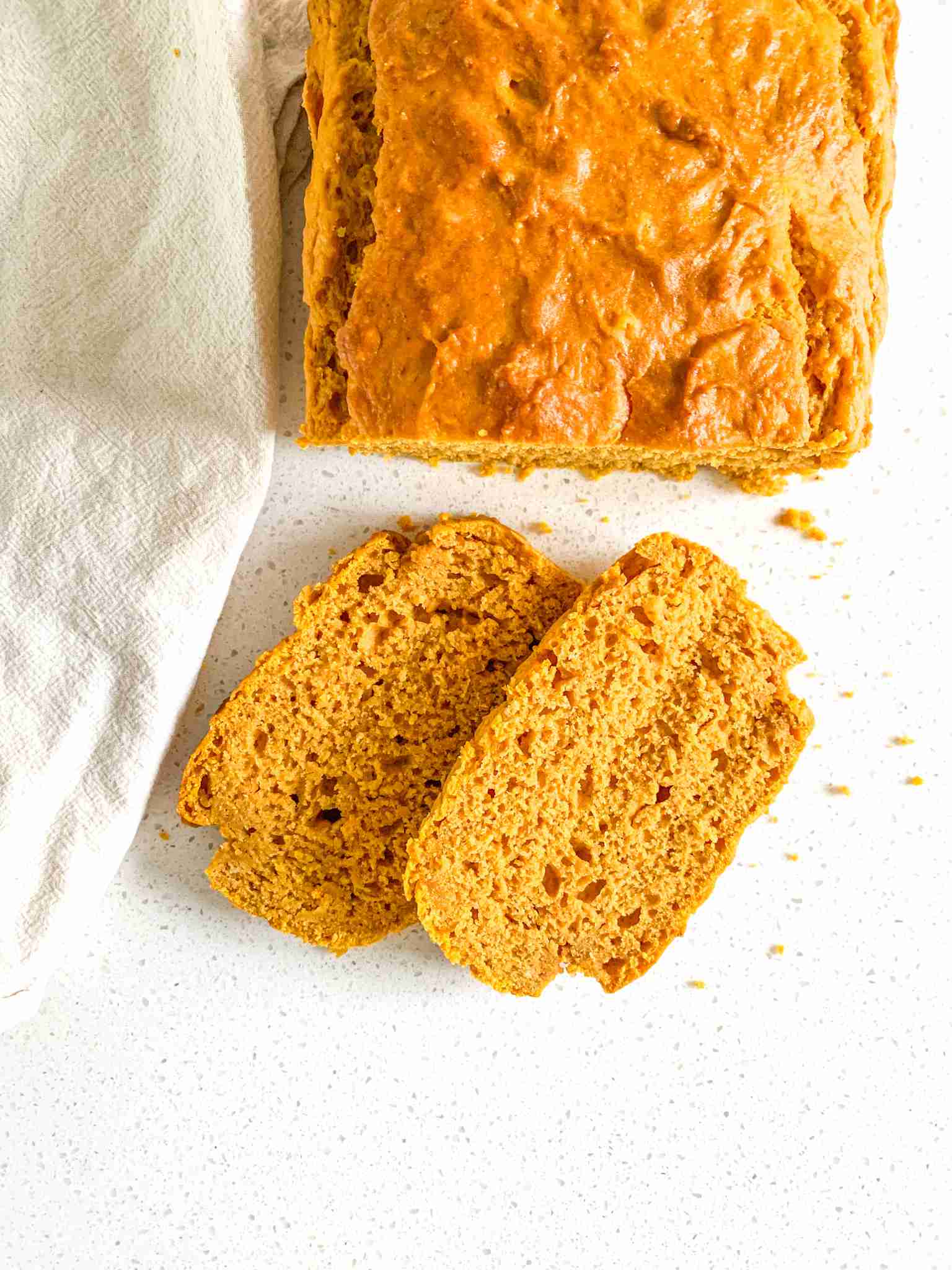 loaf and slices of pumpkin bread