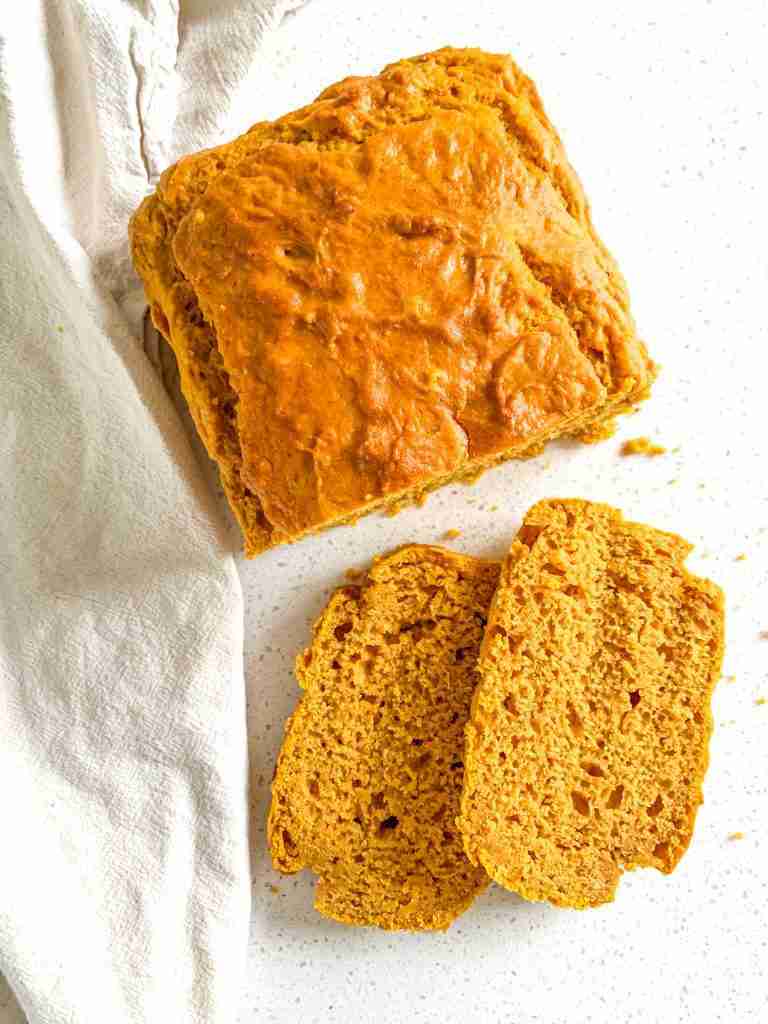 loaf and slices of sourdough pumpkin bread