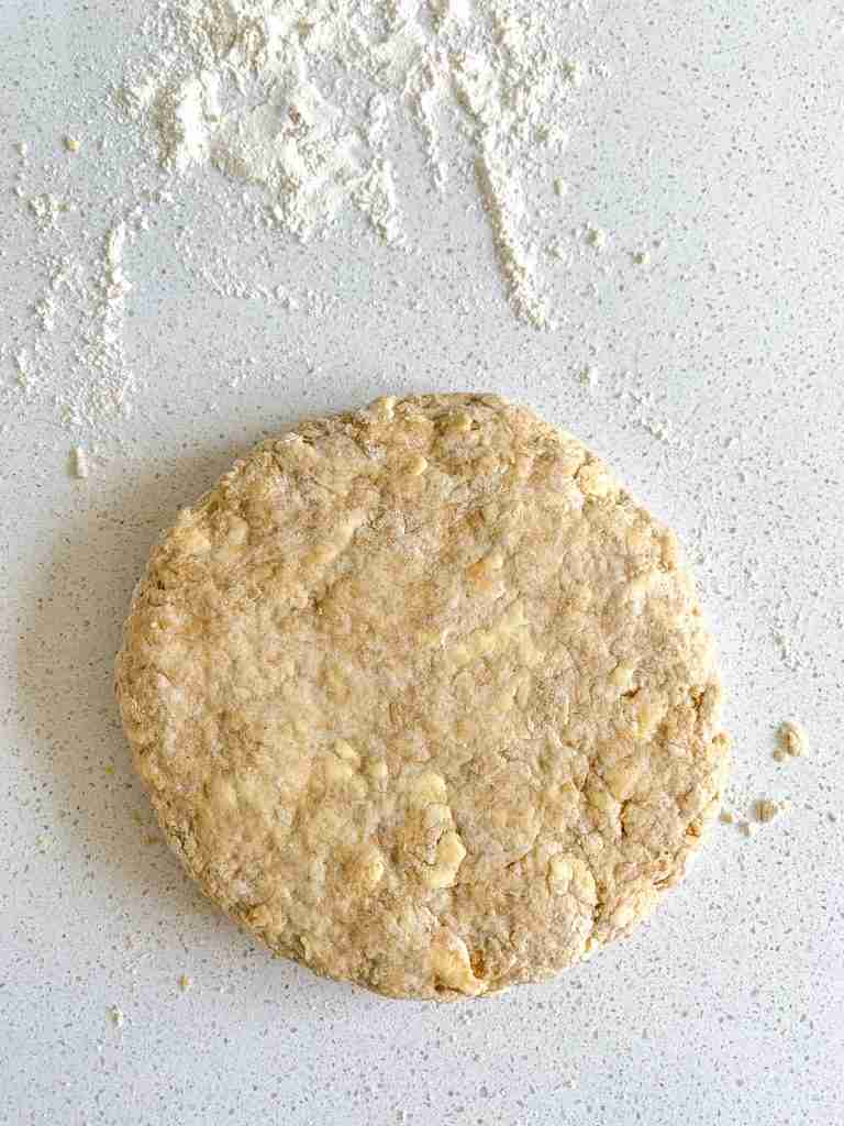 scone dough shaped into a disk