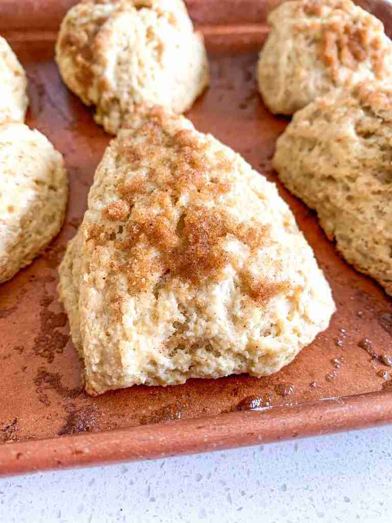 cinnamon brown sugar scones on a sheet pan
