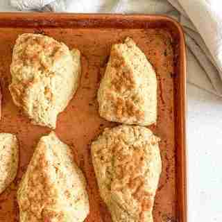 cinnamon brown sugar scones on a sheet pan