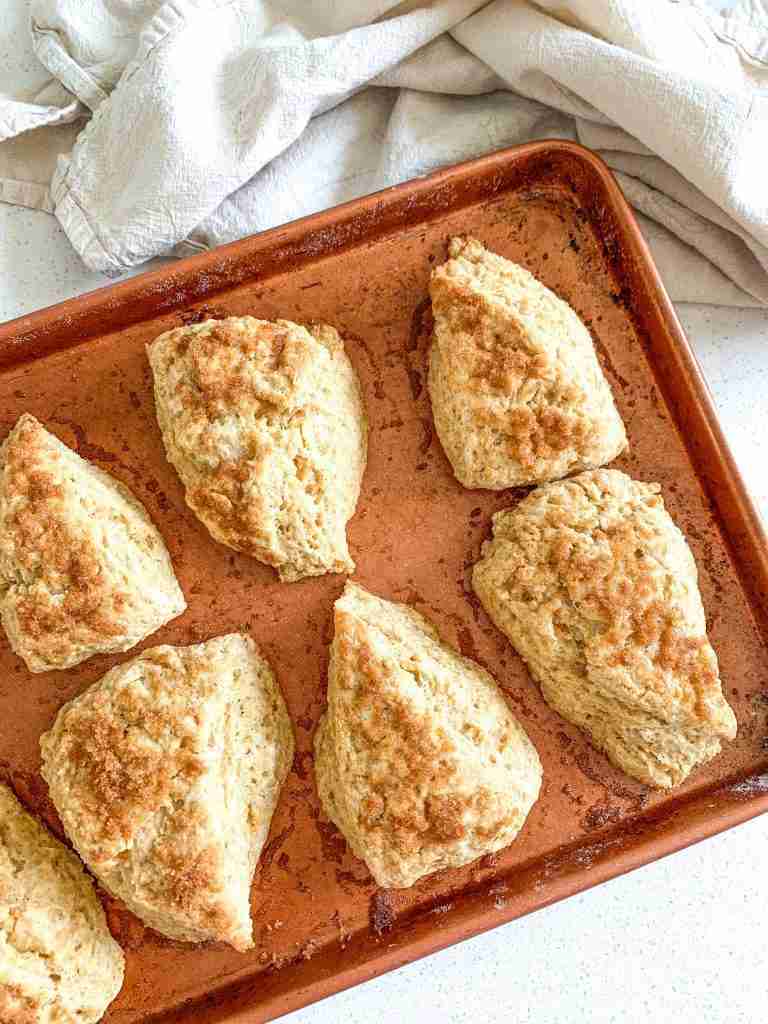 cinnamon brown sugar scones on a sheet pan