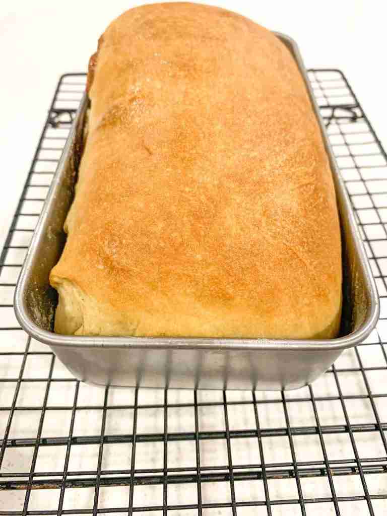baked apple bread in a loaf pan