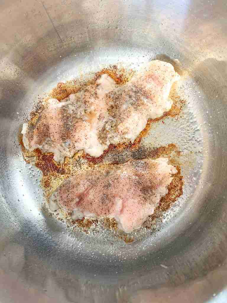 cooking chicken in a pot