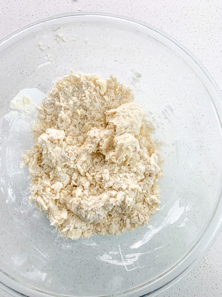 crescent roll dough ready to be brought together with your hands