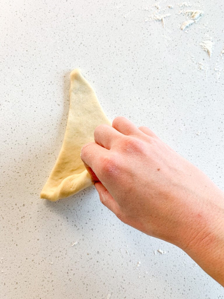 rolling crescent roll dough triangles