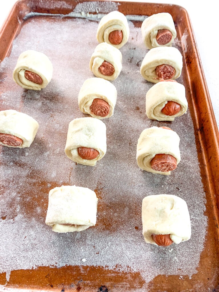 mini pigs in a blanket ready for baking