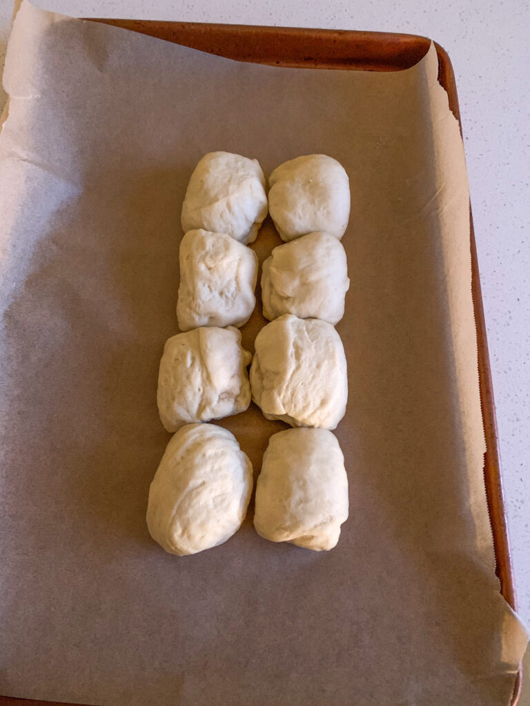 shaped mini sourdough rolls ready to proof