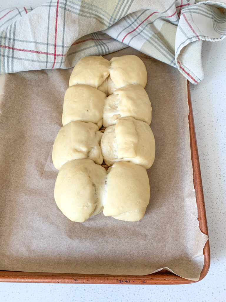 proofed mini sourdough rolls