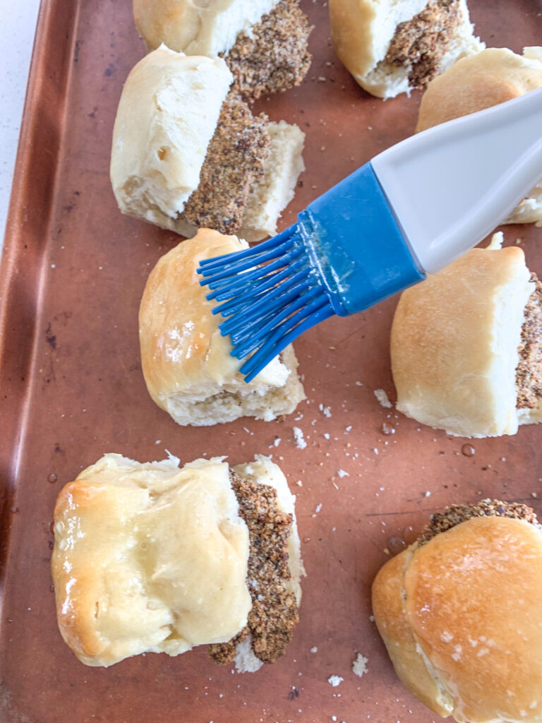 brushing chicken minis with honey butter topping