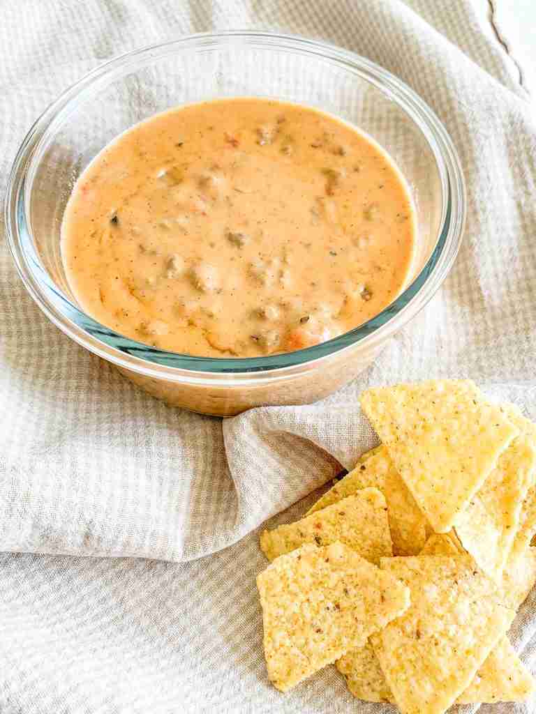 bowl of freshly made rotel dip without velvetta with chips