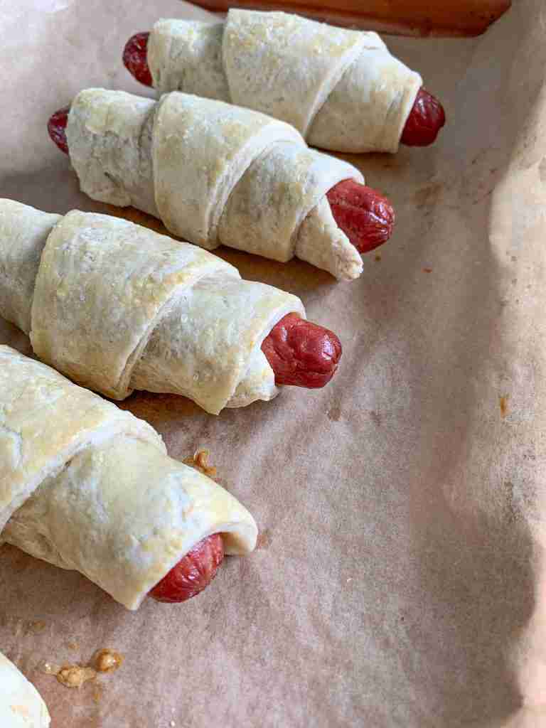 freshly baked sourdough pigs in a blanket