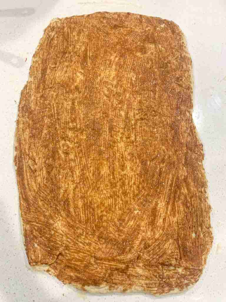 filling on a slab of dough