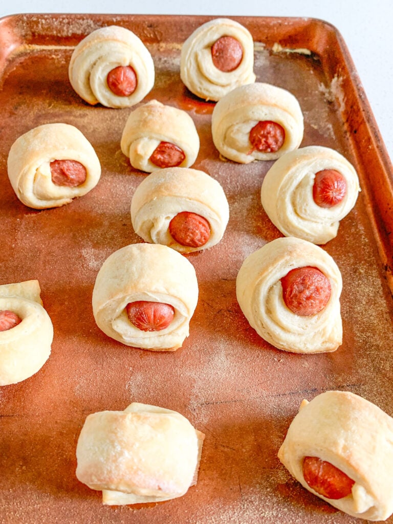 freshly baked mini sourdough pigs in a blanket