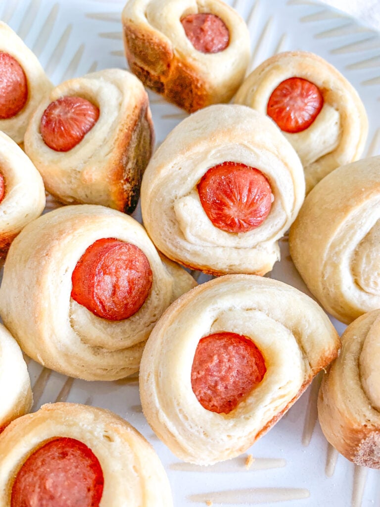 freshly baked mini sourdough pigs in a blanket