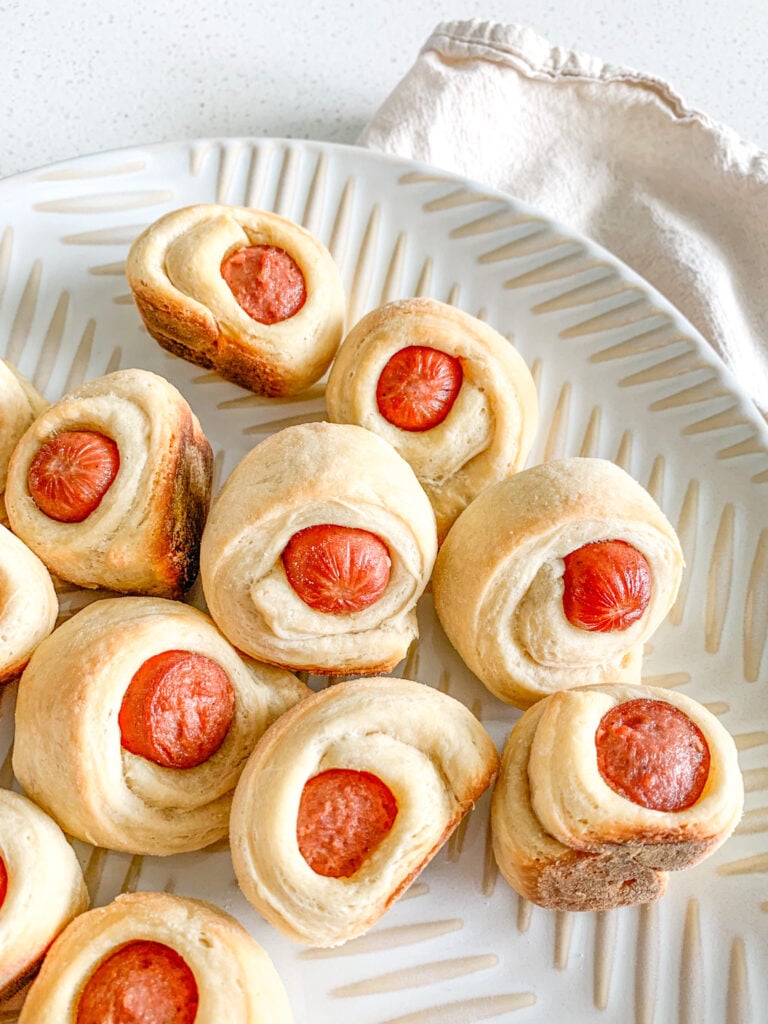 freshly baked mini sourdough pigs in a blanket